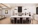 Modern kitchen with a large island, sleek black and white cabinets, and stainless steel appliances at 0000 Woodhill Cove Ln # 5, Denver, NC 28037