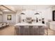 Modern kitchen featuring a large island, white cabinets, stainless steel appliances, and modern pendant lights at 0000 Woodhill Cove Ln # 5, Denver, NC 28037
