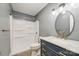 Remodeled bathroom featuring a large vanity, modern fixtures, and a step-in shower at 103 Sycamore Rd, Salisbury, NC 28147