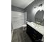 Well-appointed bathroom with a shower-tub combo, stylish vanity, and updated fixtures at 103 Sycamore Rd, Salisbury, NC 28147