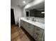 Elegant bathroom vanity with double sinks, sleek black fixtures, and ample counter space at 103 Sycamore Rd, Salisbury, NC 28147