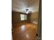 Bedroom featuring hardwood floors, natural light, and a ceiling fan, creating a comfortable retreat at 103 Sycamore Rd, Salisbury, NC 28147