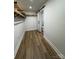 Walk-in closet with built-in shelving and an attached bathroom, providing ample storage and convenience at 103 Sycamore Rd, Salisbury, NC 28147