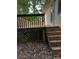 Wooden deck with stairs, perfect for outdoor relaxation and entertaining, connected to the home at 103 Sycamore Rd, Salisbury, NC 28147