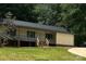 Charming single-story home featuring a welcoming front porch and well-maintained yard at 103 Sycamore Rd, Salisbury, NC 28147