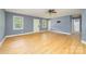 A spacious living room area with hardwood flooring, natural light, and neutral-colored walls at 103 Sycamore Rd, Salisbury, NC 28147