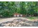 Spacious outbuilding featuring multiple garage doors and additional storage at 103 Sycamore Rd, Salisbury, NC 28147