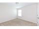 Bright bedroom with neutral carpet, white walls, and natural light from a window at 1148 Bannockburn Ave, Rock Hill, SC 29732