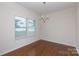 Bright dining room featuring hardwood floors, chandelier and natural lighting at 1148 Bannockburn Ave, Rock Hill, SC 29732