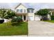 Charming two-story home with a well-maintained lawn and a two-car garage at 1148 Bannockburn Ave, Rock Hill, SC 29732