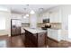 Bright kitchen with stainless steel appliances, granite countertops, and a center island at 1148 Bannockburn Ave, Rock Hill, SC 29732