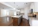 Spacious kitchen with granite countertops, stainless steel appliances, and hardwood floors at 1148 Bannockburn Ave, Rock Hill, SC 29732