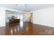 Open-concept living space with hardwood floors and an eat-in kitchen at 1148 Bannockburn Ave, Rock Hill, SC 29732