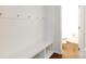 Welcoming mudroom boasts built-in bench with storage and convenient access to a half bathroom at 1148 Bannockburn Ave, Rock Hill, SC 29732