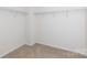 Walk-in closet featuring neutral carpet and wire shelving at 1148 Bannockburn Ave, Rock Hill, SC 29732