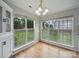 Bright dining room with big windows and hardwood floors at 1148 Stallings Rd, Matthews, NC 28104