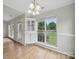 Open dining area with built in cabinet and beautiful windows at 1148 Stallings Rd, Matthews, NC 28104