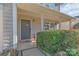 Cozy front porch with a welcoming entryway and landscaped shrubbery at 1219 Century Dr, Clover, SC 29710