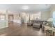 Comfortable living area featuring an expansive couch and modern flooring at 1219 Century Dr, Clover, SC 29710