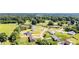 Aerial view of the neighborhood highlighting lush greenery and residential properties at 129 Sara Ln, Statesville, NC 28625