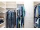 Organized walk-in closet featuring built-in shelving and hanging rods for ample storage at 129 Sara Ln, Statesville, NC 28625