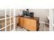 Home office with large desk, ample lighting, and wood-look floors at 129 Sara Ln, Statesville, NC 28625