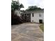 The back of this home has off-street parking and a wooden staircase at 145 Honeycutt Rd, Salisbury, NC 28144