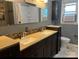 Bathroom featuring dual sinks, granite countertops, cabinet storage and tub/shower combo at 145 Honeycutt Rd, Salisbury, NC 28144