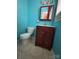 Cozy bathroom with toilet, vanity, mirror, and cabinet storage at 145 Honeycutt Rd, Salisbury, NC 28144