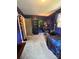 Bedroom with space themed decor, comfortable bed, and workspace at 145 Honeycutt Rd, Salisbury, NC 28144