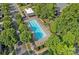 Aerial view of a community pool with ample seating and well-maintained landscaping at 16909 Red Cow Rd, Charlotte, NC 28277