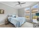 Cozy bedroom with a comfortable bed, complemented by natural light streaming through the windows, creating a peaceful retreat at 1712 Askern Ct, Waxhaw, NC 28173