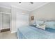 Comfortable bedroom with soft lighting, a decorative bed, and ample closet space offering a serene and functional living space at 1712 Askern Ct, Waxhaw, NC 28173