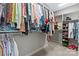 Walk in closet with hanging clothes, shelving and shoes at 1712 Askern Ct, Waxhaw, NC 28173