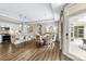 Open floor plan featuring kitchen island, dining area, and backyard access at 1712 Askern Ct, Waxhaw, NC 28173