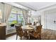 Dining area overlooking outdoor area, featuring lots of light at 1712 Askern Ct, Waxhaw, NC 28173