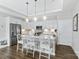Modern kitchen featuring an island with bar seating, stainless steel appliances, and an open layout for an amazing cooking experience at 1712 Askern Ct, Waxhaw, NC 28173