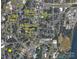 An aerial map displays the neighborhood and nearby amenities, aiding in location assessment at 205 Woods St, Mount Holly, NC 28120