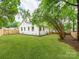 Spacious backyard features a privacy fence and lush lawn at 2114 Thurmond Pl, Charlotte, NC 28205