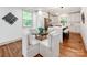 Eat-in kitchen dining area with modern chairs and a view into a spacious kitchen at 2114 Thurmond Pl, Charlotte, NC 28205
