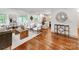 Open concept living room with hardwood floors, recessed lighting, and abundant natural light at 2114 Thurmond Pl, Charlotte, NC 28205