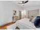 Main bedroom featuring hardwood floors, closet doors, and natural light at 2114 Thurmond Pl, Charlotte, NC 28205