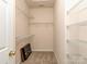 Walk-in closet with installed shelving for storage at 2169 Belle Vernon Ave, Charlotte, NC 28210