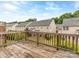 Wood deck with railing overlooking backyard at 2169 Belle Vernon Ave, Charlotte, NC 28210