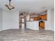 An open-concept living room and kitchen with modern flooring and ample natural light at 2169 Belle Vernon Ave, Charlotte, NC 28210