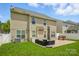 Inviting backyard with a patio, grill, and outdoor seating, ideal for relaxing and enjoying the outdoors at 2233 Sonoma Valley Dr, Charlotte, NC 28214