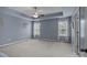 This cozy bedroom offers natural light and recessed lighting beneath the stylish tray ceiling at 2233 Sonoma Valley Dr, Charlotte, NC 28214