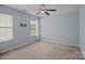 Empty bedroom featuring neutral colors, natural light, and ample space for personalization at 2233 Sonoma Valley Dr, Charlotte, NC 28214