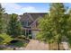 Well-maintained home with mature trees, a spacious driveway, and attractive curb appeal at 2233 Sonoma Valley Dr, Charlotte, NC 28214
