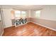 Bedroom showcasing wood floors, two windows, and neutral colored walls at 2625 Glenn St, Newton, NC 28658